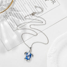 Load image into Gallery viewer, save_the_ocean_jewelry_jewellry_australia_uk_canada_helping_save_sea_life_animals_help_oceans_creatures_sea_turtles_sharks_whales_turtle_tracker_bracelet_dolphin_dolphins_whale_shark_wave_ring_anklets_bracelets_necklace_earrings_anklets,choker_rings_tshirt_caps_apparel_seashell_shell_charity_conservation_beach_life_helping_seas_oceans_planet_coral_reefs_wildlife